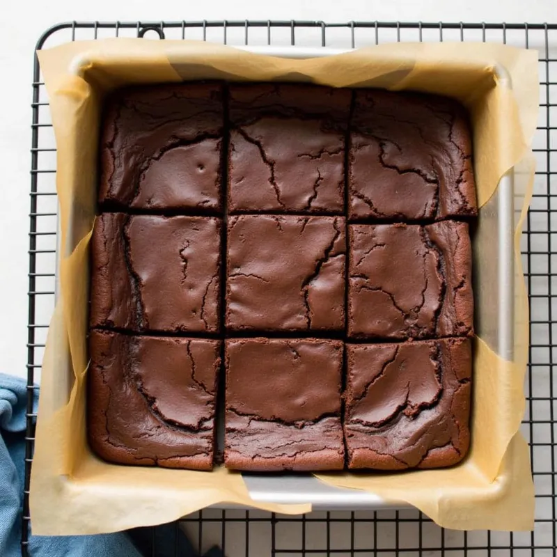 Baked black bean vegan brownies cooling in a pan