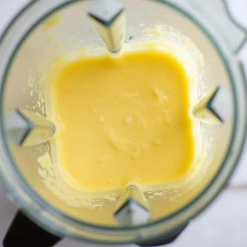 Blending all ingredients for vegan butter in a blender