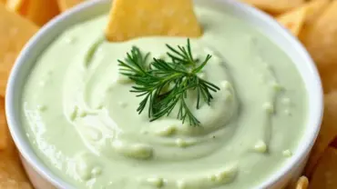 Creamy Cashew Dill Dip in a bowl with chips