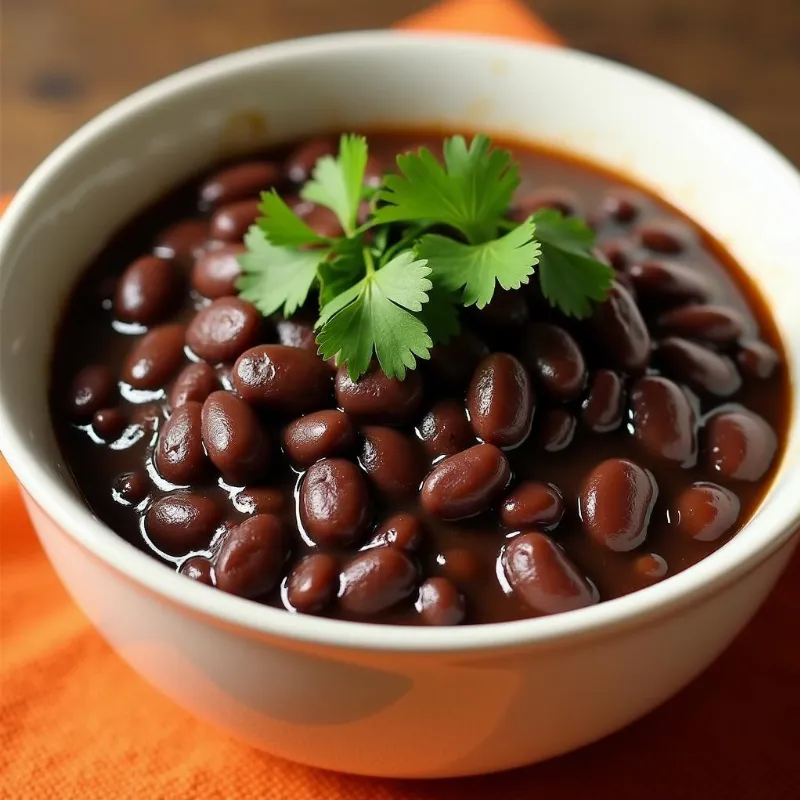 Bowl of Vegan Cuban Black Beans with Cilantro Garnish