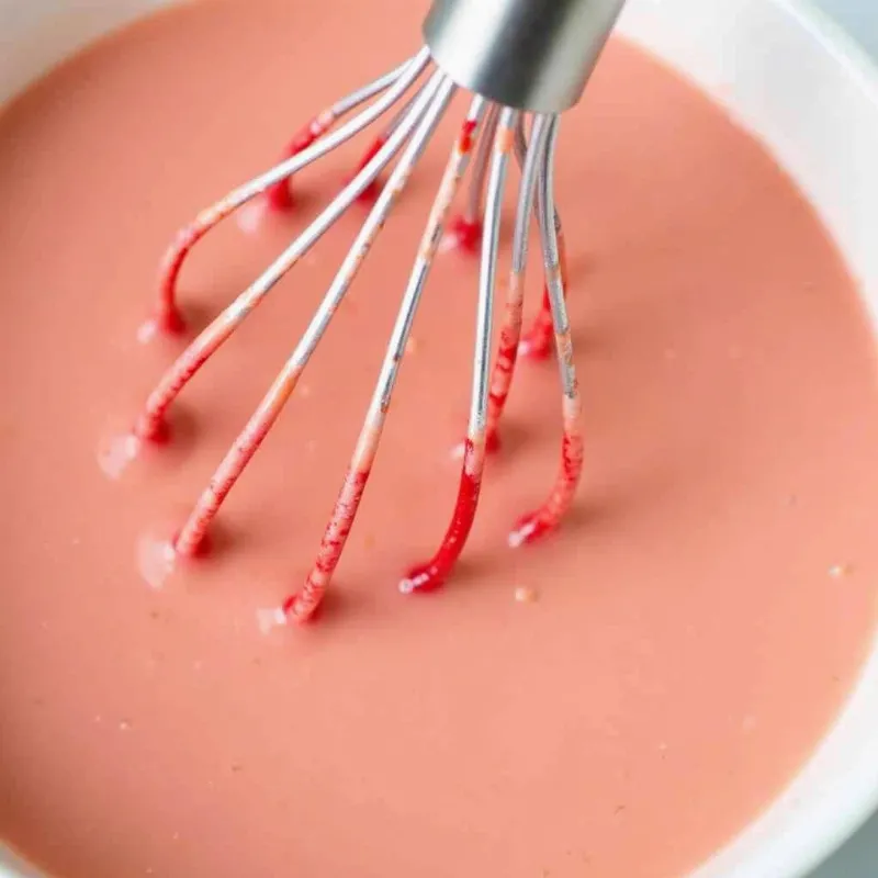 mixing wet ingredients for vegan red velvet cake