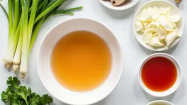 Red white vegan ramen ingredients laid out on a table