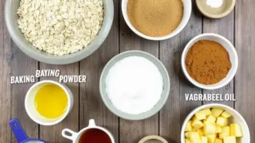 Ingredients for vegan apple oat bundt cake arranged on a wooden table