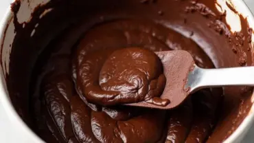 Vegan black bean brownie batter in a mixing bowl