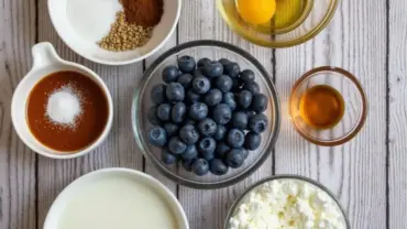 Vegan Blueberry Muffin Ingredients Laid Out on a Table