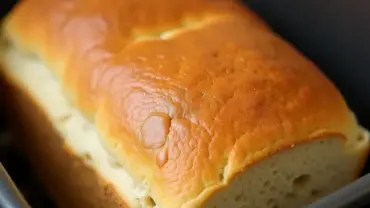 Freshly baked vegan bread in a breadmaker