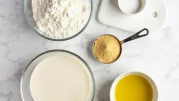 Vegan bread ingredients arranged on a counter