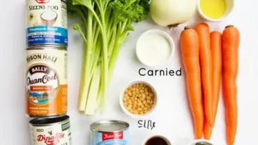 Vegan chicken pot pie ingredients laid out on a table.