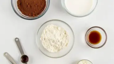 vegan chocolate crinkle cookie ingredients laid out on a table