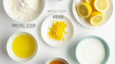 Vegan lemon pound cake ingredients laid out on a table.