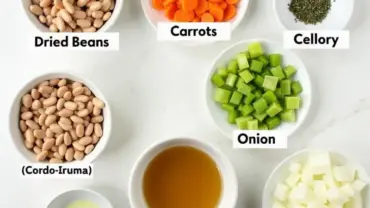 Ingredients for vegan navy bean soup laid out on a table