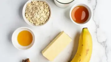 Vegan oat muffins ingredients laid out on a countertop