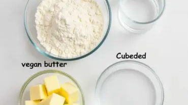 Vegan pie crust ingredients arranged on a white table