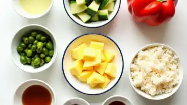 Colorful array of ingredients for vegan pineapple fried rice.