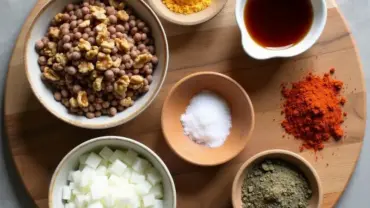 Vegan sausage ingredients arranged on a wooden board