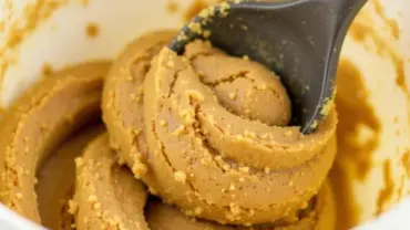 Vegan snickerdoodle cookie dough in a mixing bowl