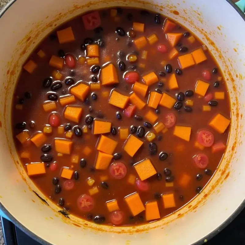 Vegan sweet potato chili simmering