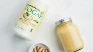 Vegan yogurt ingredients displayed on a kitchen counter